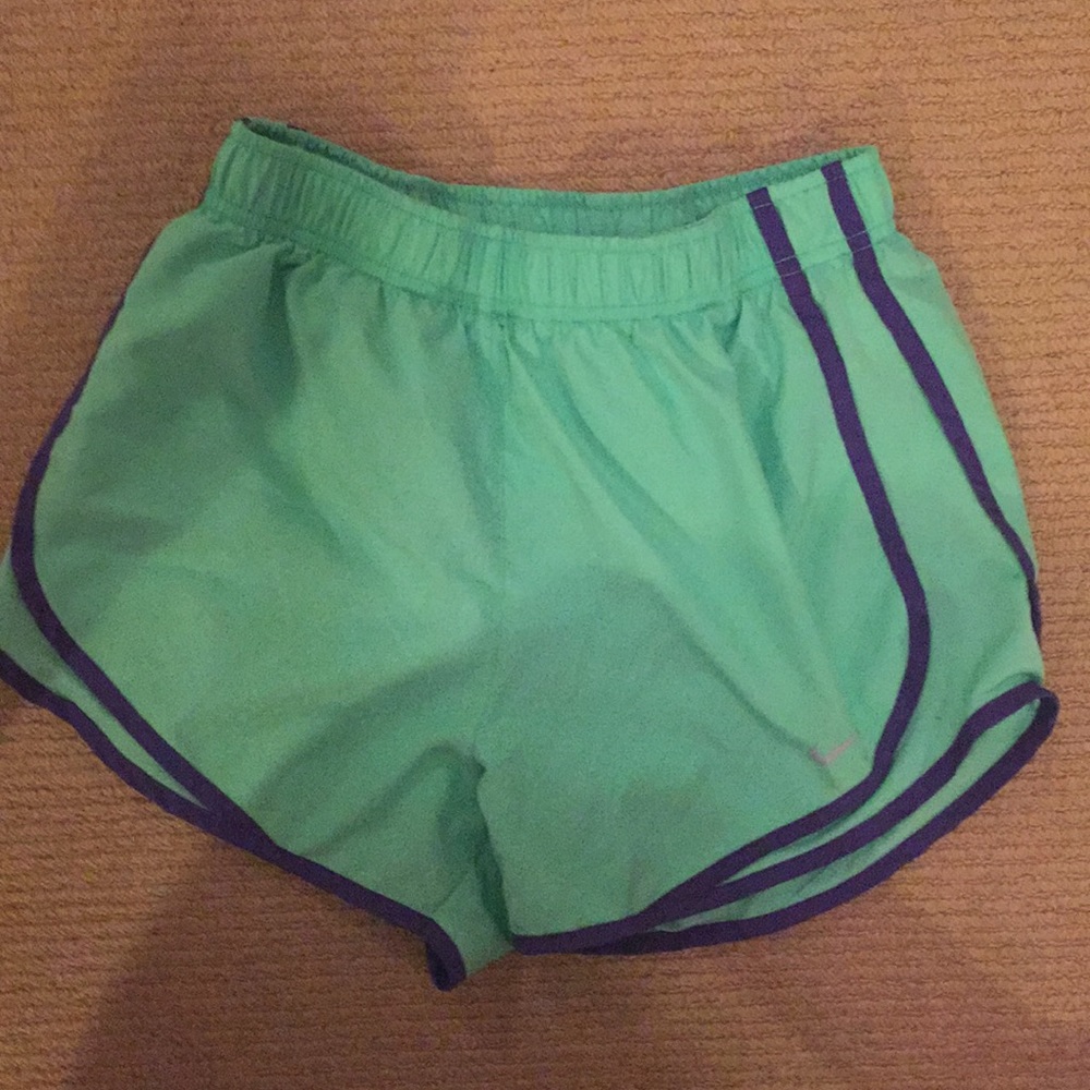 Green and purple Nike shorts